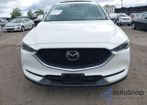 2021 Mazda Cx-5 Grand Touring Reserve z USA, uszkodzony, nr VIN JM3KFBAY9M0420344